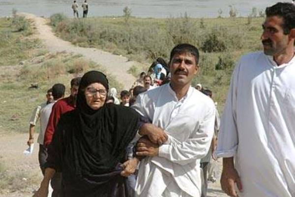 قوات امنية تعتقل ثلاثة ارهابيين كانوا مندسين بين الاسر النازحة الى النجف